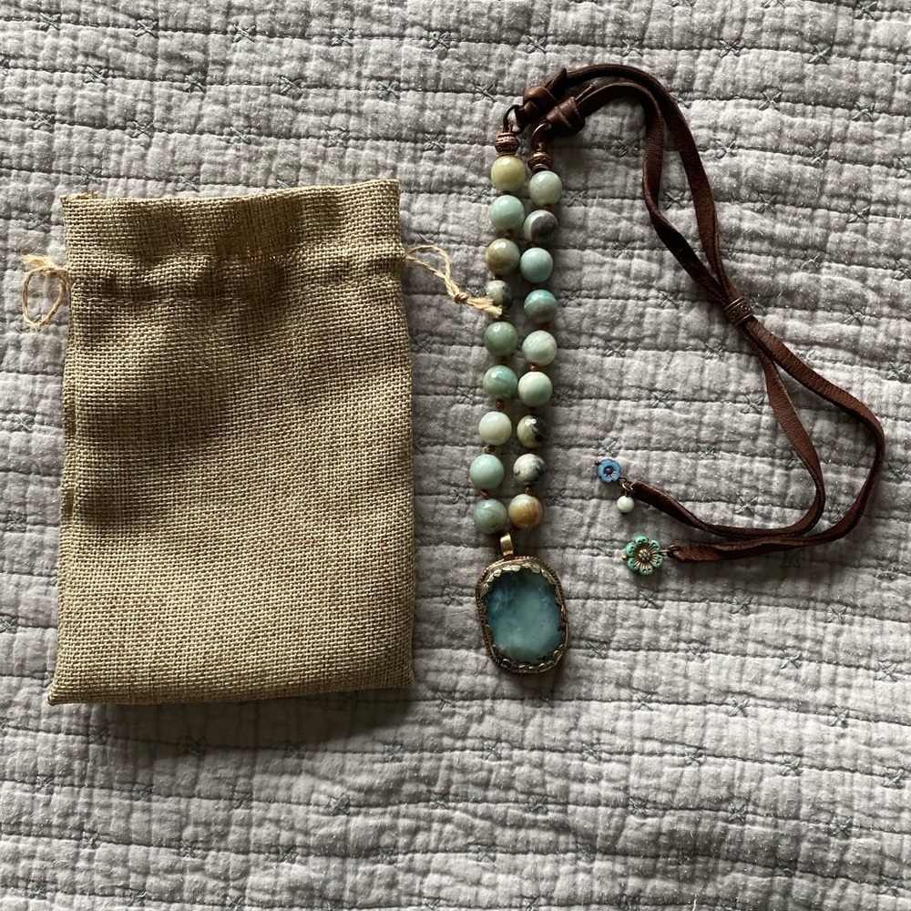 New, never worn stone and leather necklace